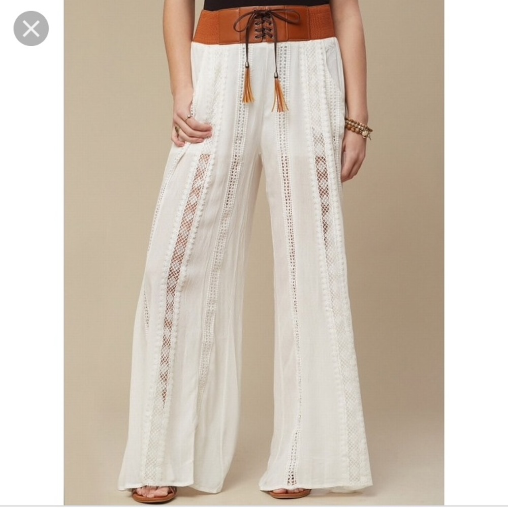 Boho white wide leg crinkle pants.